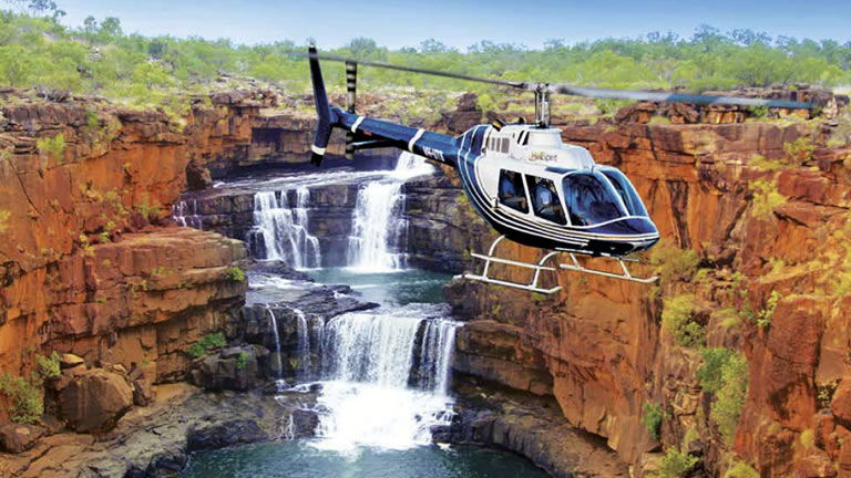 Helicopter over Mitchell Falls with APT