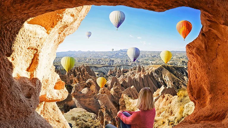 Balloons floating over Cappadocia, Turkey Balloons floating over Cappadocia, Turkey