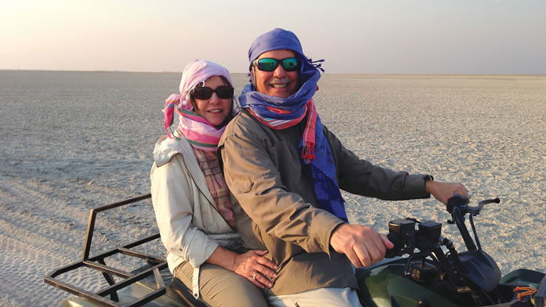 Couple quad biking in a Tauck Culturious tour Couple quad biking in a Tauck Culturious tour