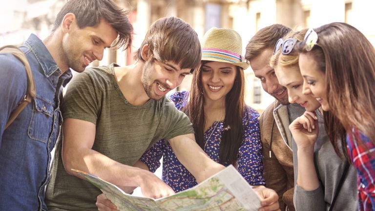 Traveller Group Looking at Map